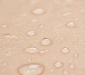 Текстура кожи и капли воды